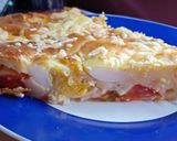 Foto del paso 4 de la receta: Torta de masa líquida, queso, tomates, ciboulete y huevo😍😍😋😋