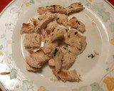 Foto del paso 4 de la receta: Patata asada, rellena de filetes de pollo al ajillo y perejil