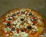 A picture of step 10 of Sweet and sour chicken pizza.