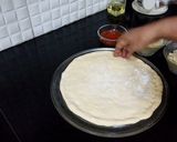 A picture of step 10 of Chicken Tikka Pizza.