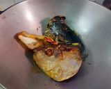 A picture of step 1 of Muri Ghonto : Fish Head curry with Gobindobhog Rice.