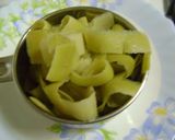 A picture of step 1 of Lau Er Khosha Bata (Bottle Gourd Peel Chutney - Bengali Style).