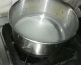 A picture of step 3 of Ashtami special prasaad the puri chana and halwa thali.