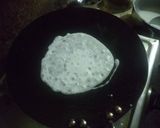 A picture of step 10 of Poush pitha thali.