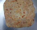 A picture of step 9 of Cheesy pizza sauce paratha.