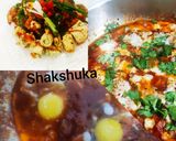 A picture of step 11 of Shakshuka with warm garlic bread (poached eggs in spicy sauces).