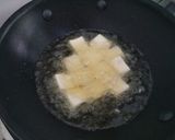 A picture of step 2 of Stir Fried Chinese Kale with Tofu and Mushrooms.