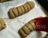 A picture of step 10 of Nutella stuffed caterpillar buns.
