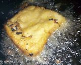 A picture of step 6 of Bread coated with akara paste.