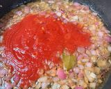 Foto del paso 2 de la receta: Arroz de pollo al ajillo