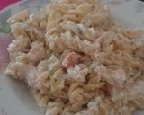 A picture of step 2 of Fusilli with salmon and cream.
