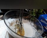 A picture of step 4 of Oreo butterfly cheese cake.