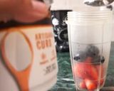 A picture of step 1 of Strawberry and black grapes smoothie.