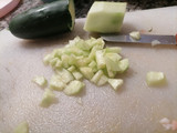 Pomodori ripieni di tonno, mozzarella e dadolata di cetrioli al profumo di basilico