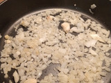 Arroz meloso con alcachofas y conserva de cerdo