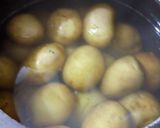 A picture of step 1 of Kashmiri Dum Aloo.