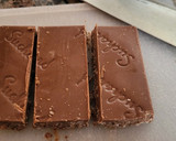 Foto del paso 3 de la receta: Cañas de hojaldre rellenas de turrón de chocolate y mermelada de naranja