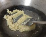 A picture of step 1 of Sooji Sheera.