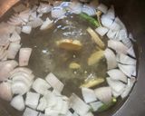 A picture of step 2 of Fish Stew with Kaatla in Thakurbari style.