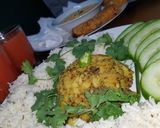 A picture of step 4 of Jhatpata allu with zeera rice.