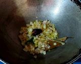 A picture of step 4 of Chingri diye kochu shaak.