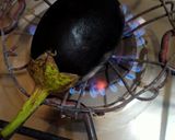 A picture of step 1 of Baingan ka raita.