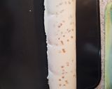 A picture of step 11 of Grand Marnier Bûche de Noël with Mandarin Insert.