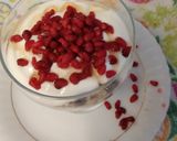 A picture of step 2 of Super healthy breakfast bowl topped with pomegranate seeds.