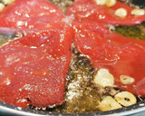Foto del paso 2 de la receta: Migas de Bacalao confitadas con Piquillos caramelizados