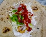 A picture of step 6 of Chapati roll with less oil.