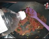 صورة لخطوة 5 من وصفة فول بالخضار🥕🍅 والطحينة بطشة الخل والثوم 😋