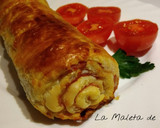Foto del paso 9 de la receta: Rollo de hojaldre relleno de jamón, huevo duro, olivas y queso