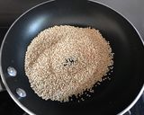 A picture of step 1 of Almond, sesame and jaggery fudge (badam gur papadi).
