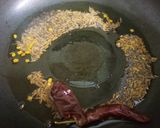 A picture of step 4 of Brinjal Kadhi with bajra roti.