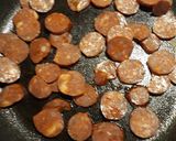 A picture of step 1 of Chorizo and Eggs in a Cheesey Tomato Sauce.