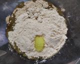 A picture of step 2 of Jaggery fritters (gulgule).