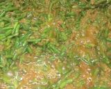 A picture of step 6 of Alu matar mongray.