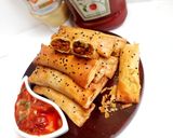 A picture of step 15 of Crunchy chicken filo cigars.