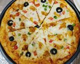 A picture of step 5 of Chicken Tikka Pizza 🍕🍕.