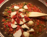 Foto del paso 10 de la receta: Cazuela de merluza con almejas y patatas rosadas