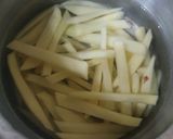 A picture of step 1 of Fries cottage with cheese.