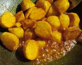 A picture of step 3 of Masala baby potatoes.