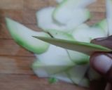 A picture of step 1 of Sweet raw mango pickle.