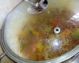 A picture of step 14 of Potatoe chicken soup.