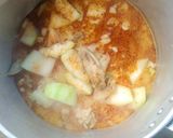 A picture of step 4 of Green Curry Chicken with Winter Melon.