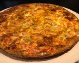 Une image de l'étape 5 de Quiche sans pâte aux poivrons, tomates et lardons.
