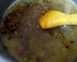 A picture of step 6 of Scrumptious thai shrimps soup with red sauce bread.