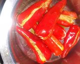 A picture of step 3 of Stuffed red chilli pickle.