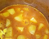 A picture of step 8 of Alu ki tarkari.