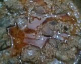 A picture of step 6 of Kaleji Masala with Naan.